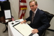 Taoiseach Enda Kenny signs Book of Condolences for the Late Ambassador Chris Stephens