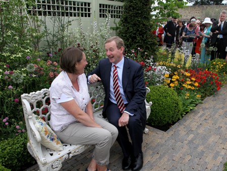 Taoiseach Enda Kenny with designer Jane McCorkell in her garden entitled Bord na Mona Growise My Garden, which won the overall prize
