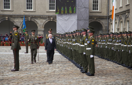 President Michael D. Higgins reviews the Guard of Honour